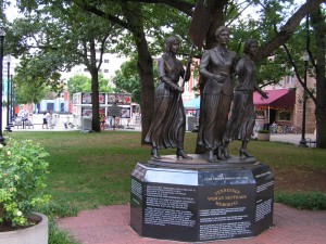 Tennessee Woman's Suffrage Memorial on Market Square. Tennessee Woman's Suffrage Memorial on Market Square. Note GAP display in background.