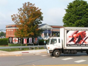 Trucks and signs at Liberty University Bookstore.